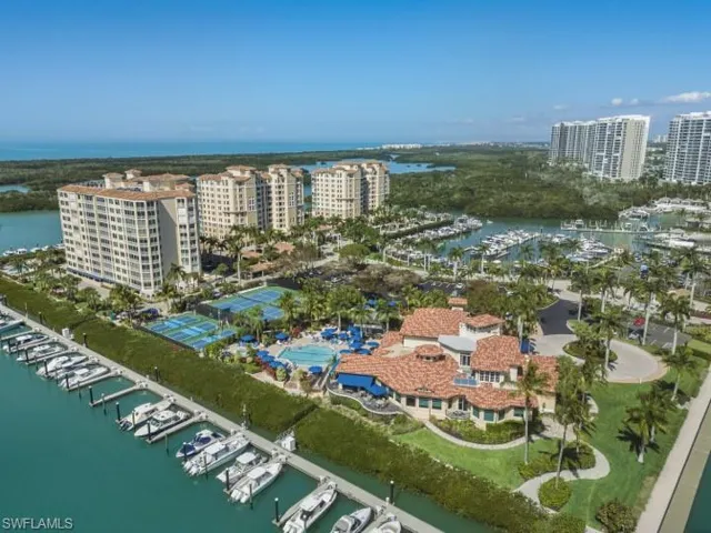 Bird's eye view of a marina and a nearby body of water