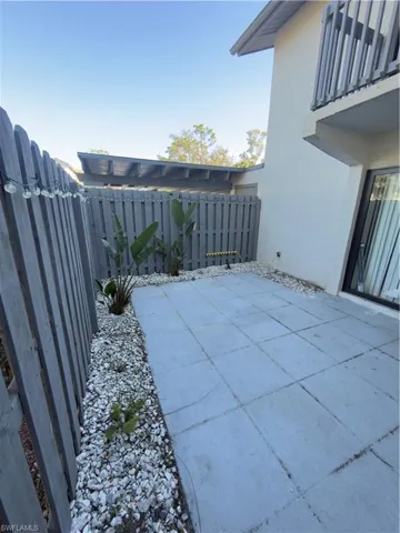 Fenced backyard featuring a patio area