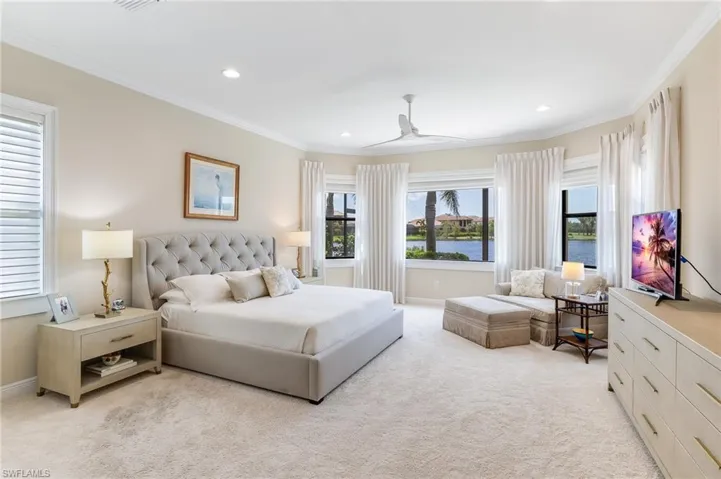 Primary bedroom with king size bed - lake views