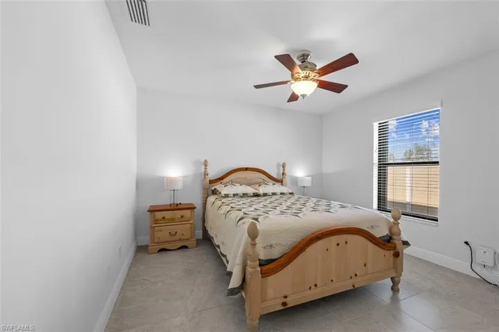 Second spare bedroom perfect for guests, family member or an office! Featuring large closet.