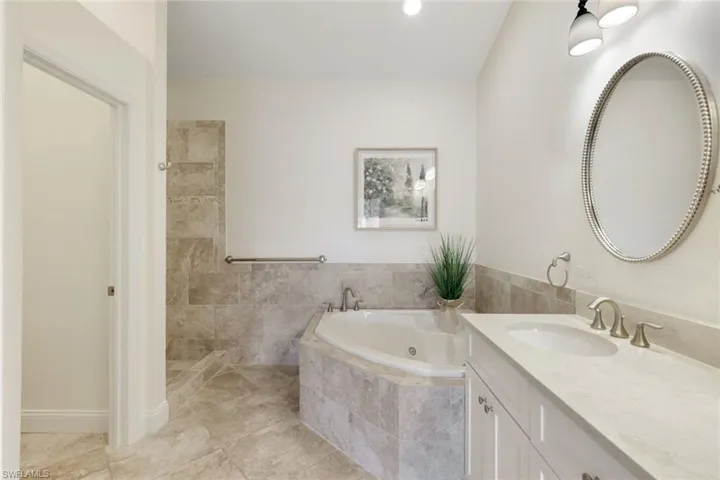 Master bathroom with soaking tub and walk in shower.
