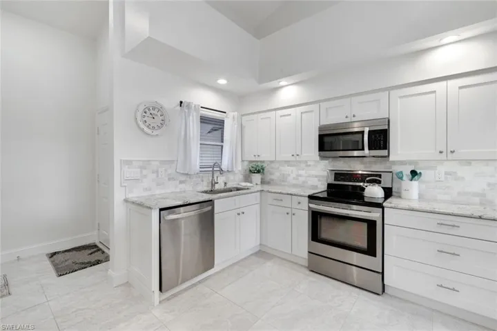 Gorgeous custom cabinetry, newer appliances -- this home has it ALL!