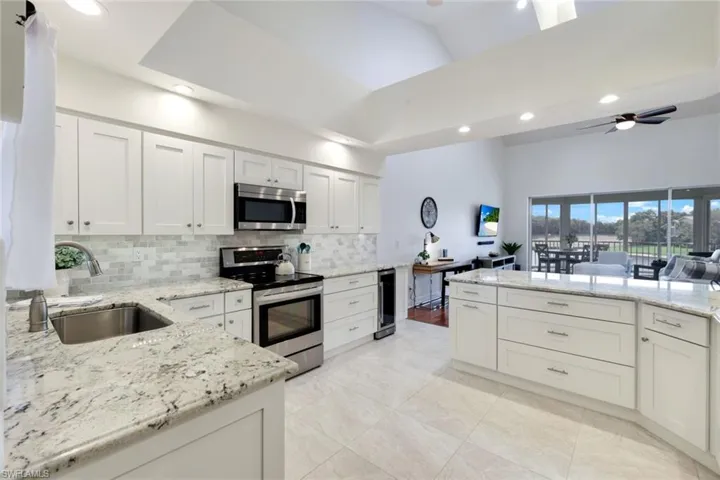 Prepare your favorite meals while chatting with guests. Gas cooktop, state of the art appliances, gorgeous cabinets, Quartz and backsplash!