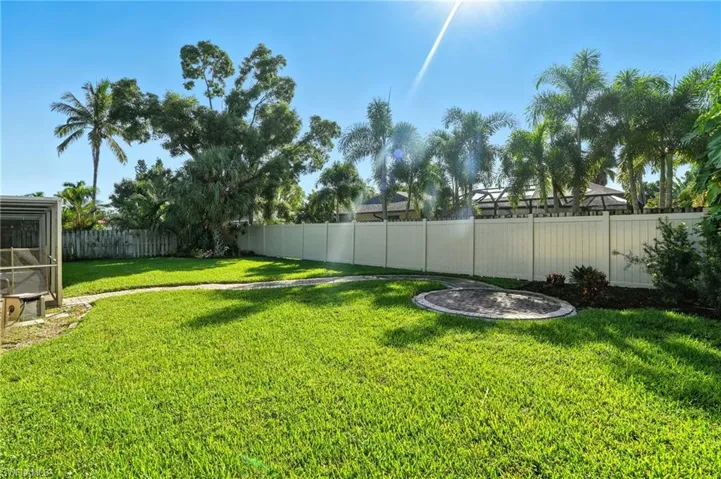 View of fenced backyard