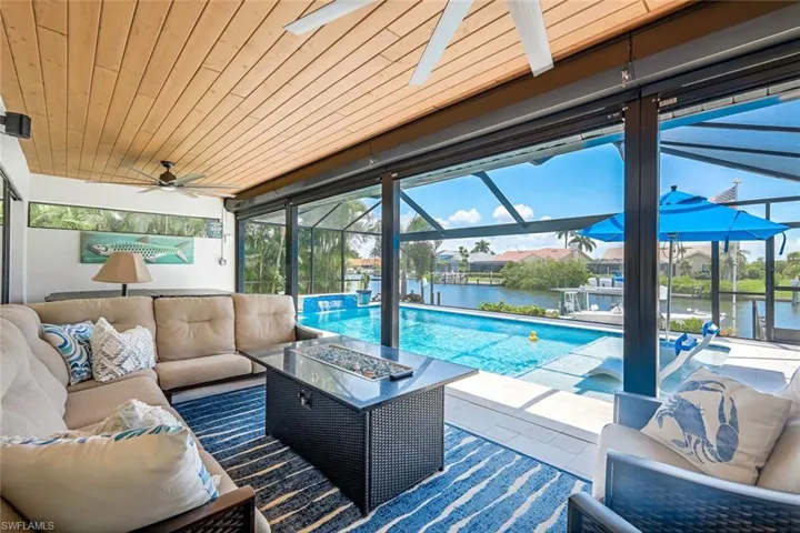 Spend your morning, afternoons, or evenings overlooking the pool and canal enjoying your favorite beverage! Tongue and grove ceiling.