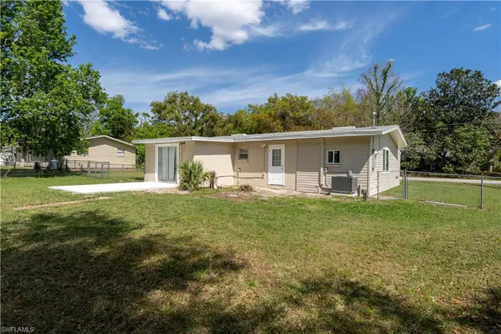View of front of house with a front yard
