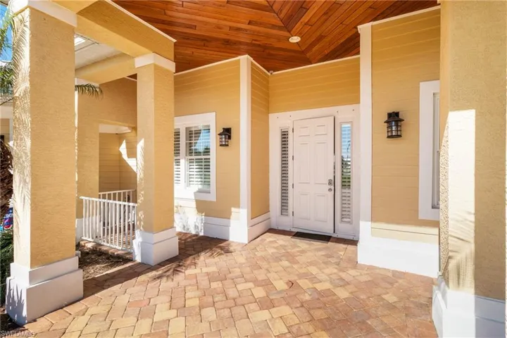 Property entrance with a porch
