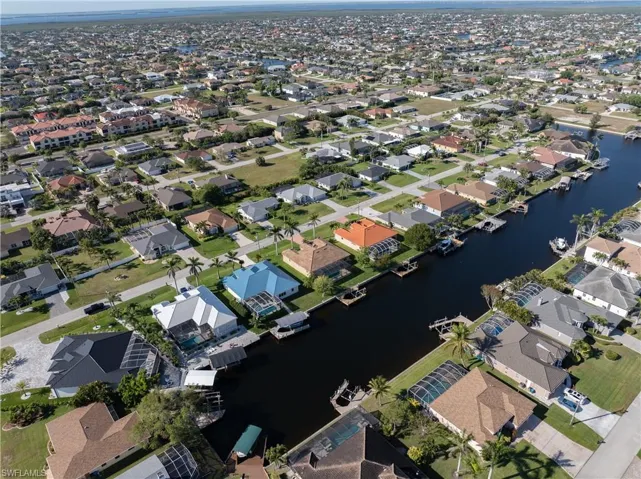 Bird's eye view with a residential view and a water view