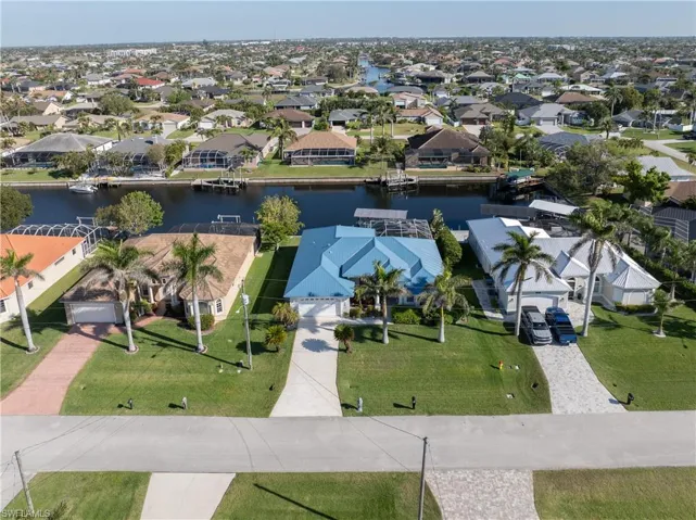 Bird's eye view with a residential view and a water view