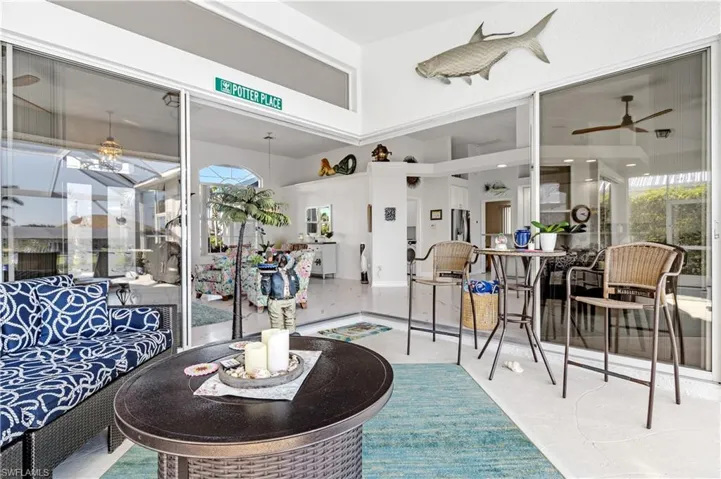 Living area featuring a ceiling fan