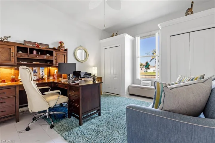 Office area featuring ceiling fan
