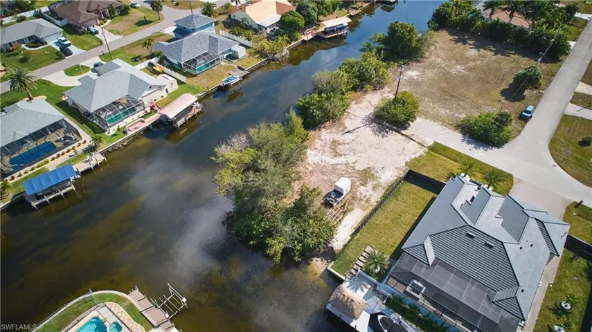 Waterfront lot offering direct canal access and ample space for development