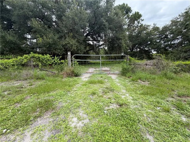 Gate to large fenced area