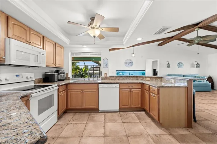 Kitchen with granite countertops and plenty of cabinet and counter space