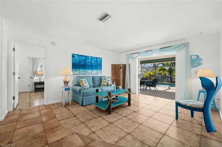 Living area with pool views