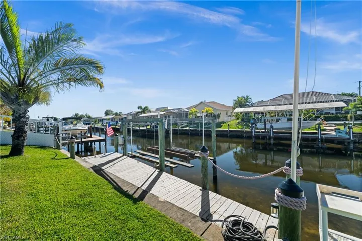 Boat lift and captain's walk just steps from the lanai