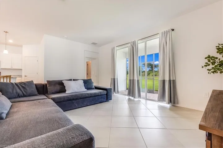 Living room with view of patio.