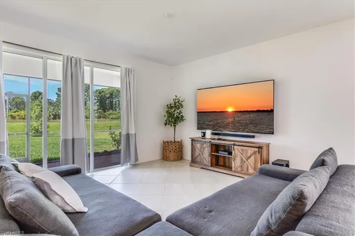 Living room with view of patio.