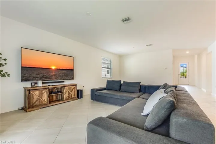 Living room with ample lighting.