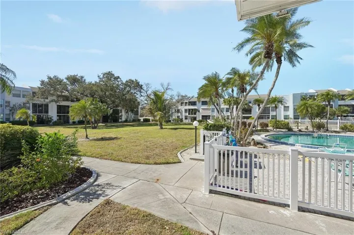 View of community featuring a pool and a patio area