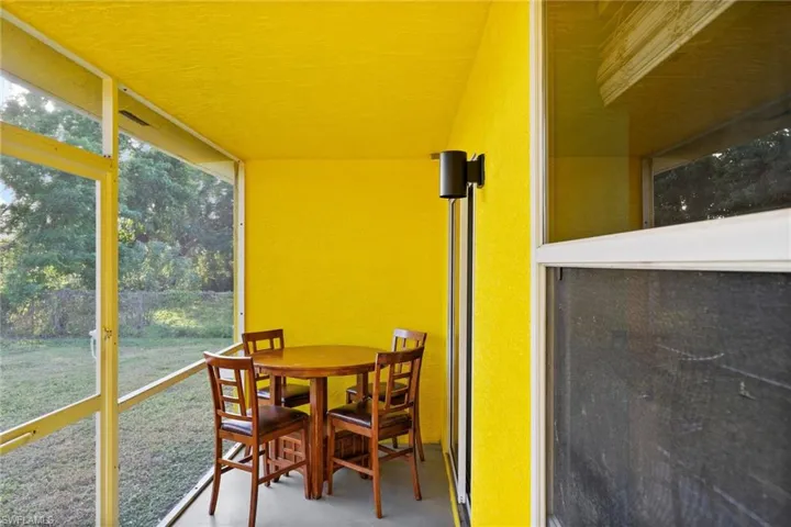 Sunroom featuring plenty of natural light