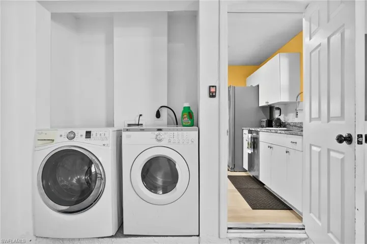 Clothes washing area with washing machine and dryer
