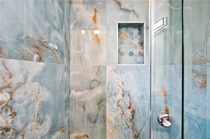 Room details with walk in shower