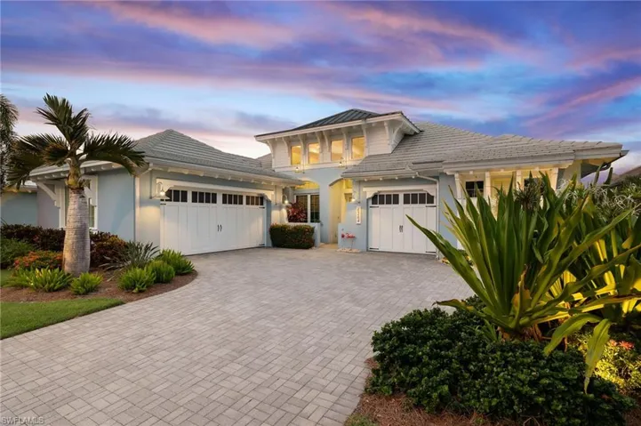 View of front of home featuring a garage