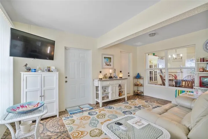 Living room featuring a notable chandelier