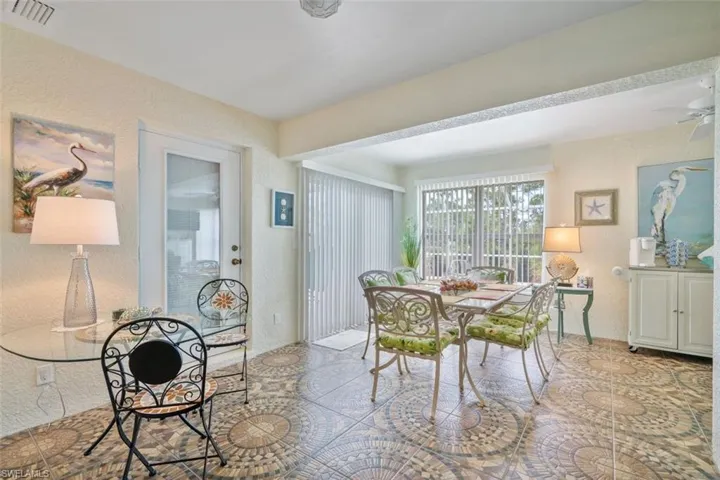 Dining space with ceiling fan
