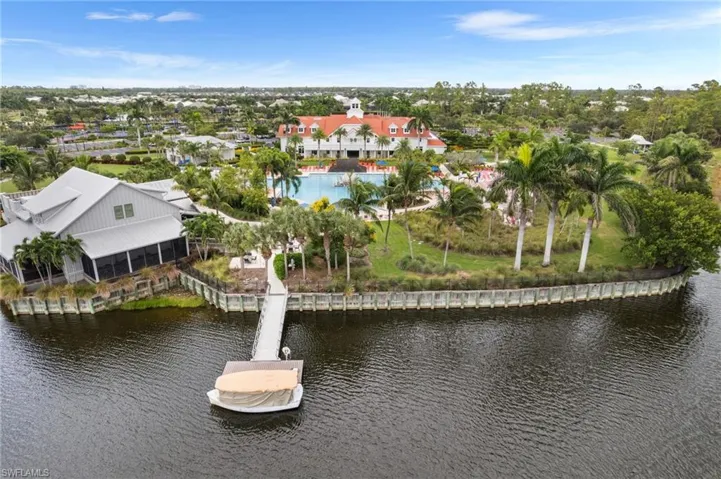 Aerial view of a large body of water and a pool area