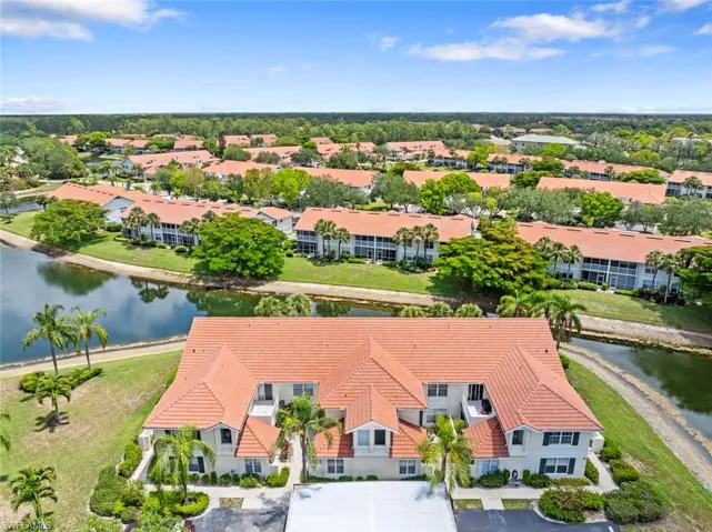 Private cul-de-sac lake view location with no thru-traffic at 4970 Deerfield Way, North Naples