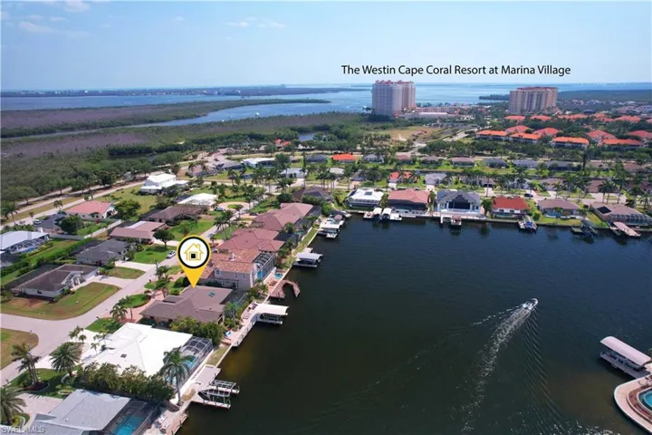 Aerial view with a residential view and a water view