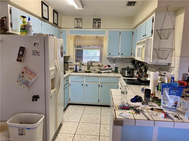 A galley style kitchen with lots of cabinets