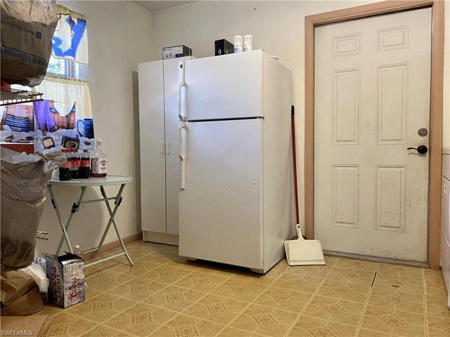 A massive utility/laundry room at 12' x 9'