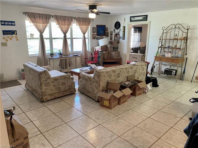 A substantial living room at 20' x 13'