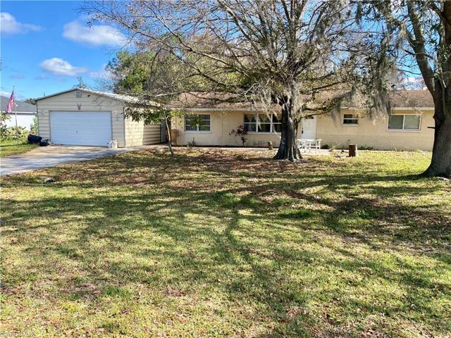 This home offers a large front yard
