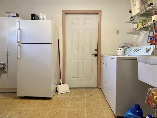 A massive utility/laundry room at 12' x 9'
