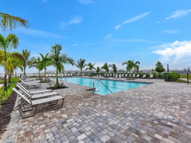 Community pool with a patio area