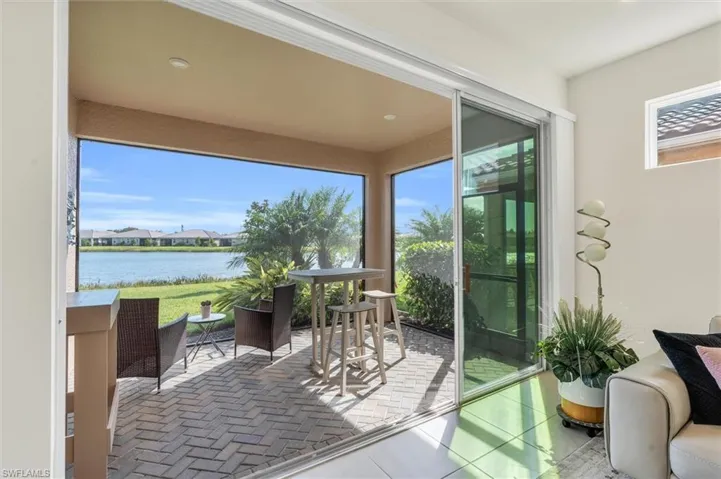 Large sliders open up to the screened-in lanai.