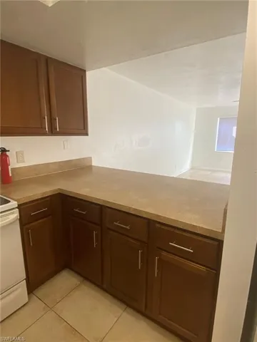 Extra wide Kitchen counter also serves as pass-thru to living room