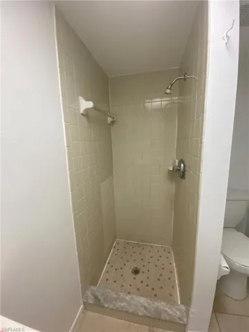 Master bath has tiled shower