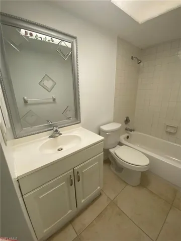 Guest bathroom features tub/shower combo