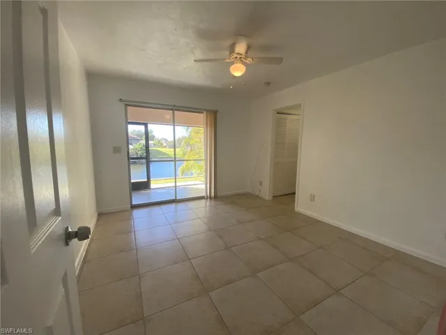 Master bedroom has great view of the Canal and has private entrance to the screened Lanai.