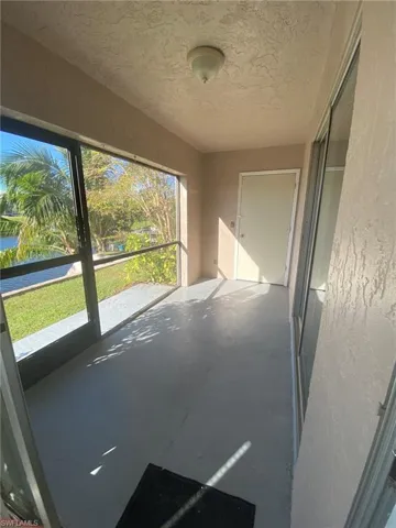 Screened Lanai overlooks canal. Sliders from Living room and Master Bedroom. Additional storage closet.