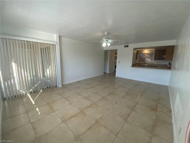 Large counter bar for seating or entertaining, opens to spacious Living area.