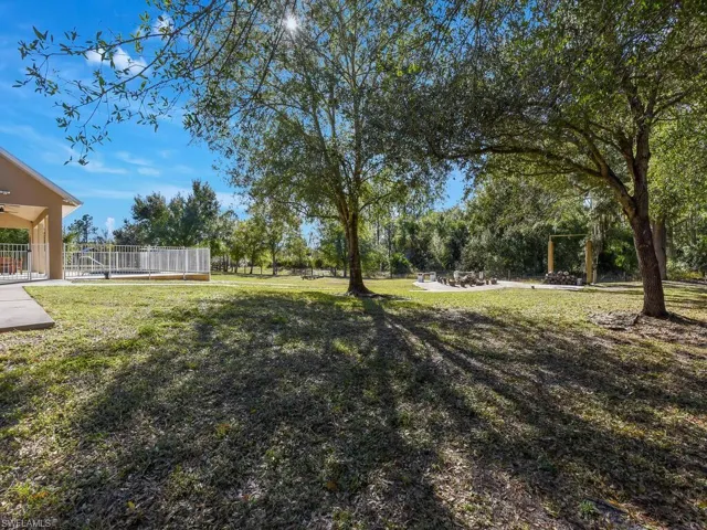 View of yard with a patio