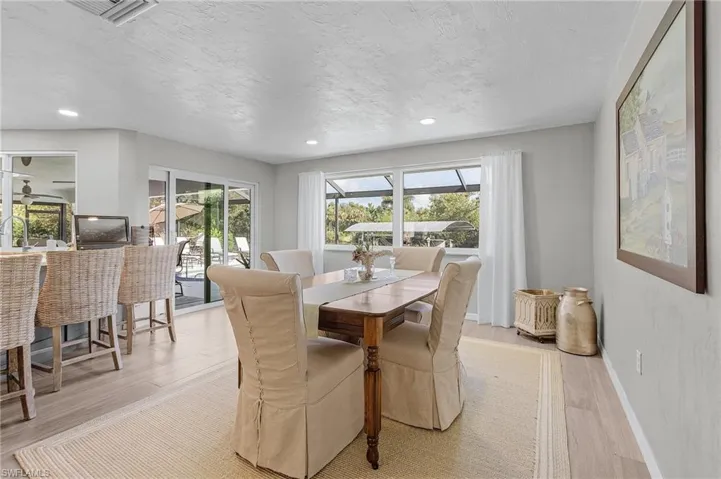 Dining space with views of canal/pool.