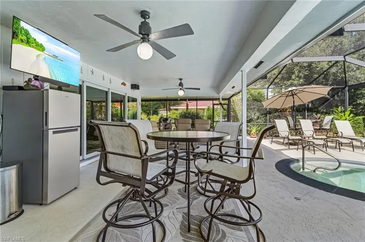 View of patio overlooking pool.