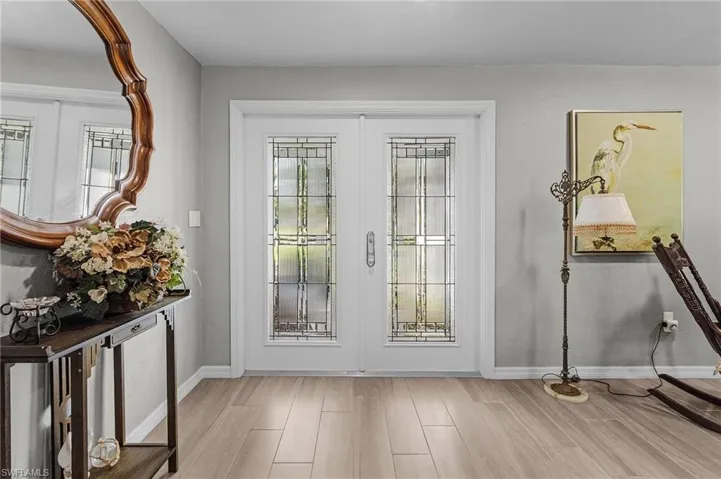 French door entryway provides a wealth of natural light.